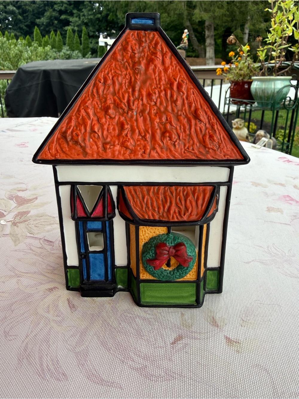 Holiday Ceramic House Figurine with Orange Roof and Green Wreath votive holder
